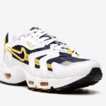 Air Max 96 II sneakers The Nike Air Max 96 II feature a white, black, and 'Midnight Navy' colour combination. First, the pair features navy mesh on the upper while white leather adorns the overlays. Following a 'Golden Yellow' around the Swoosh, running across the sides, and tongue branding. Finishing the look, white colour appears on the midsole and black on the rubber outsole.